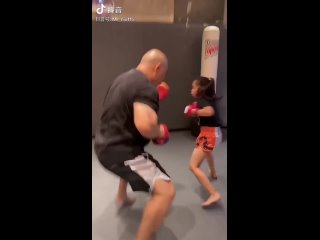 chinese girl kicks her paws